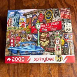 Springbok 2000-Piece Puzzle with Vintage Signs and Blue Car
